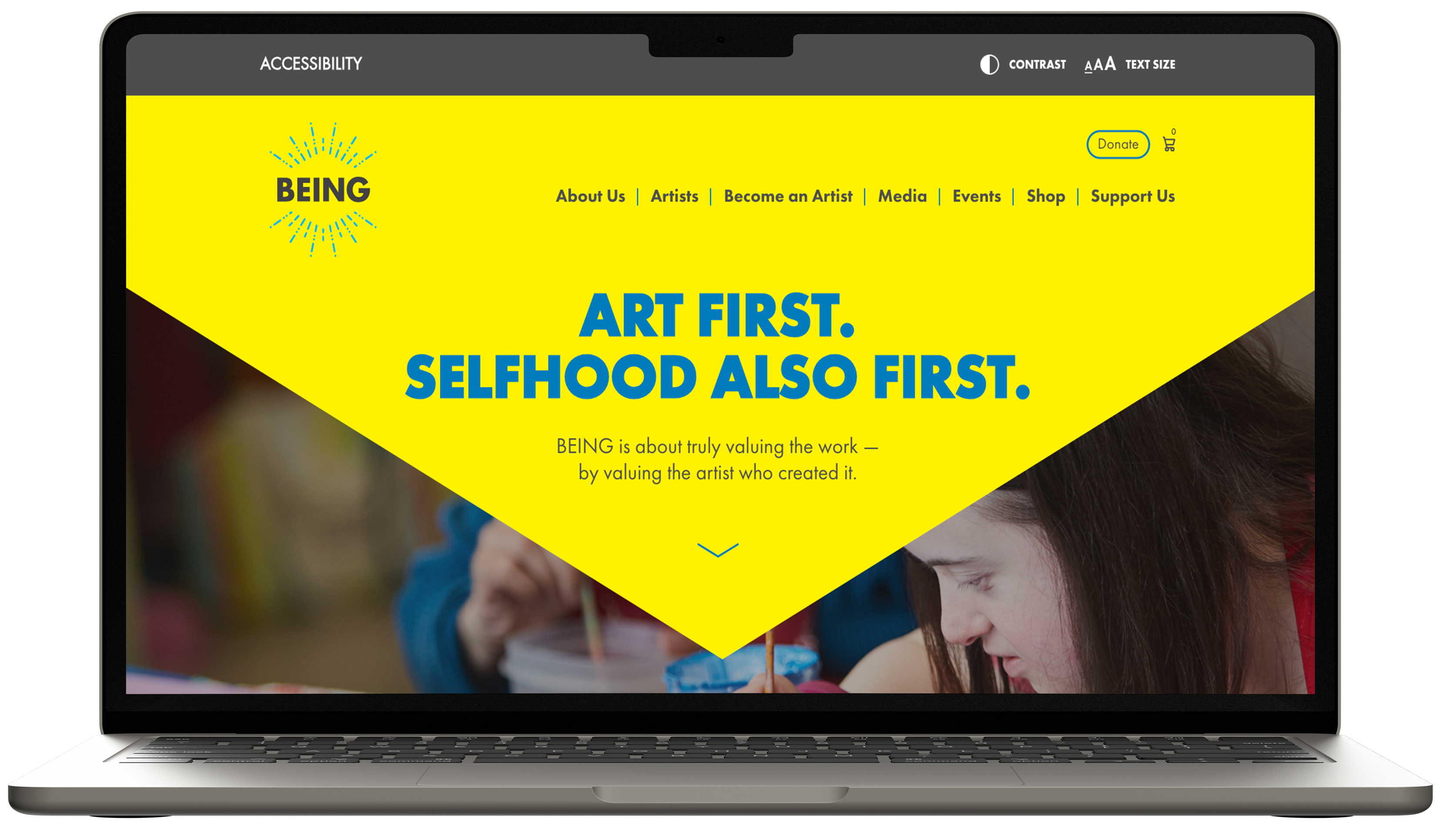 BEING Studio website on laptop